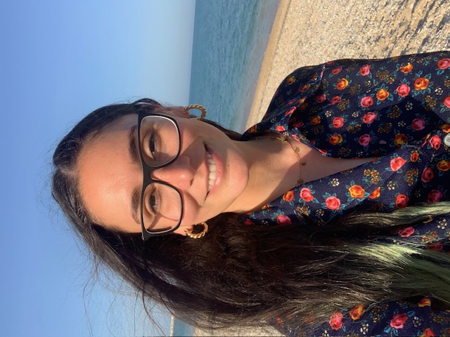 Kendall Seal, Executive Career Coach, smiling on a beach